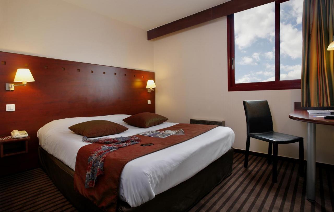 Hotel Gallieni Женвилье Номер фото